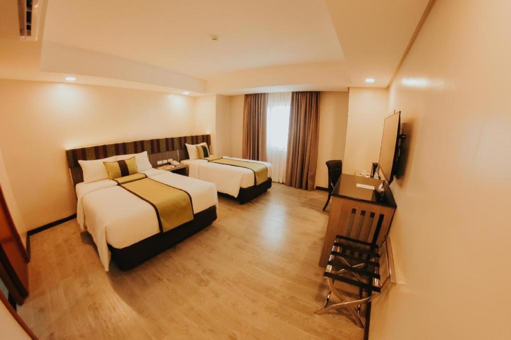 แกรนด์ ซิง อิมพีเรียล โฮเทล Hotel อีโลอีโลซิตี้ ภายนอก รูปภาพ